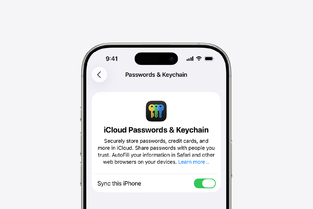 iPhone screen showing iCloud Passwords and Keychain with the option to sync passwords on this device enabled